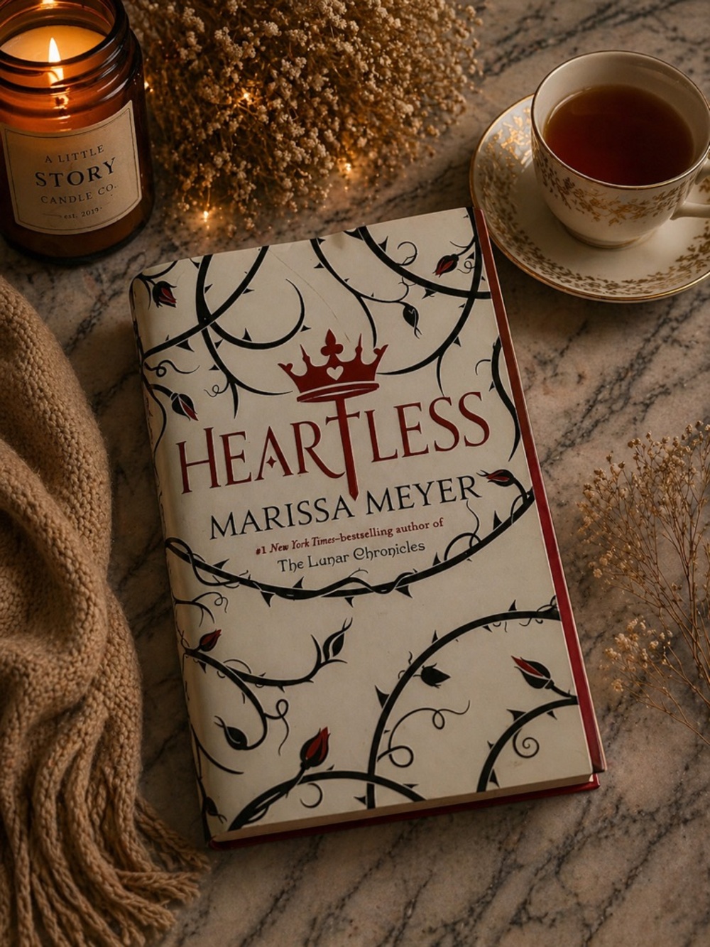 Heartless by Marissa Meyer - Red & Cream Paperback Book